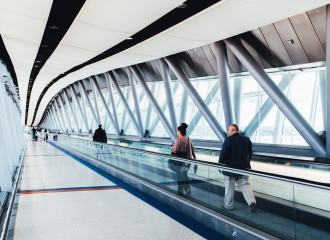 A view up an escalator in a modern airport